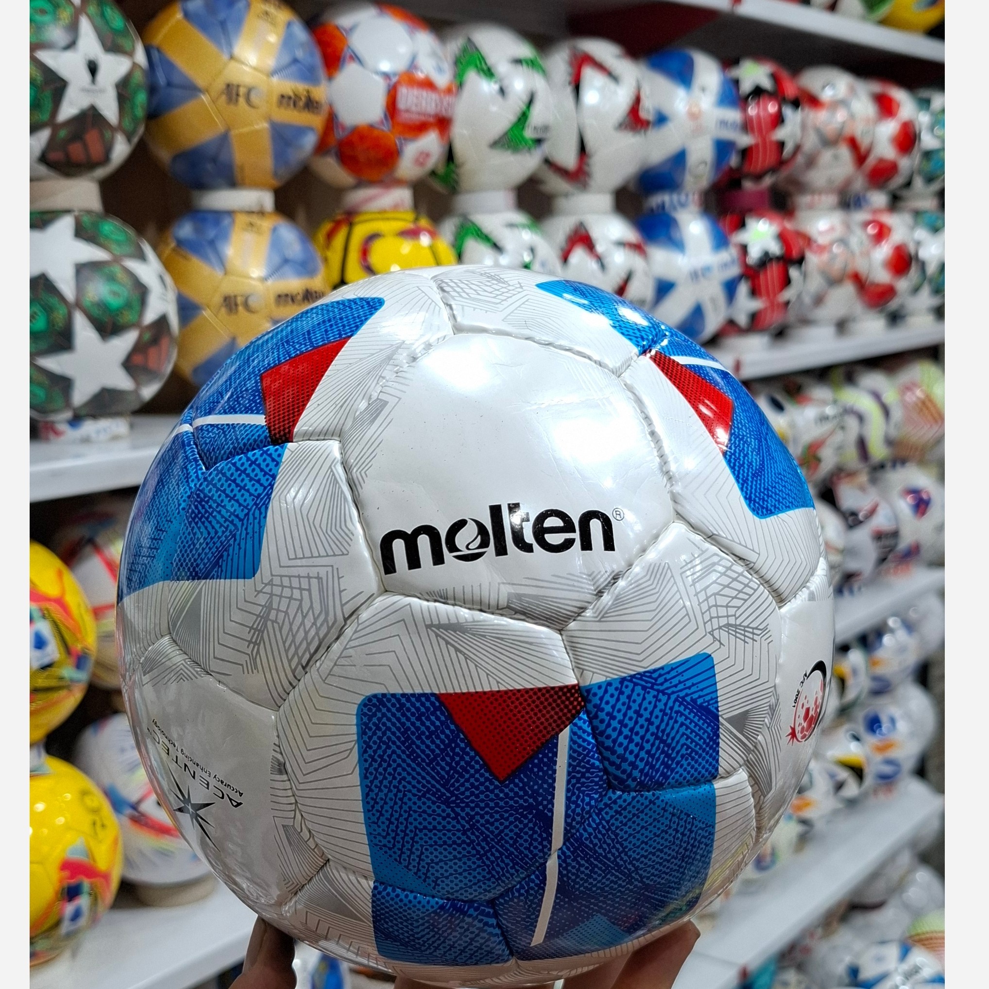 توپ فوتبال مولتن اصل پاکستان سایز 5اصل با ضمانت همراه با سوزنی وارسال رایگان در ارزانکده توپ کرمان 