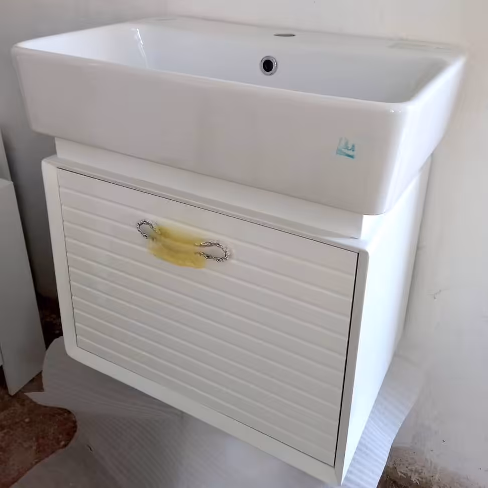 روشویی کابینتی فلت 60 درجه یک سفید. هزینه ارسال بصورت پس کرایه و برعهده مشتری است