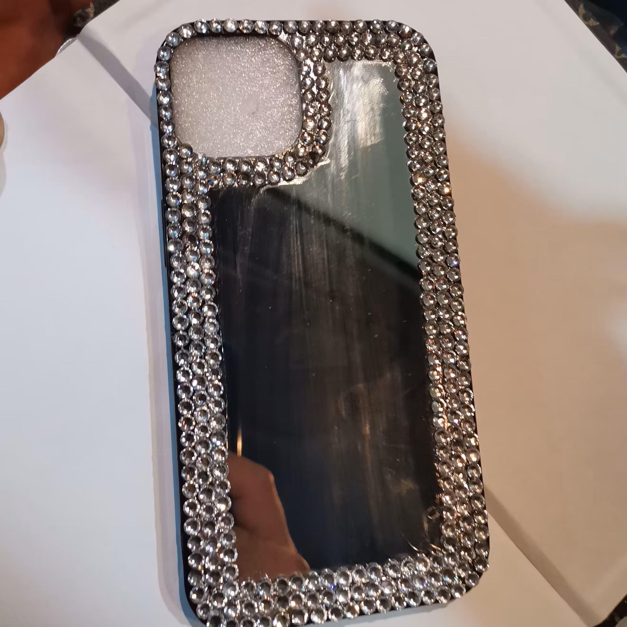 قاب گوشی طرح آینه ای نگین دار مناسب گوشی iphone 13 pro رنگ نقره ای