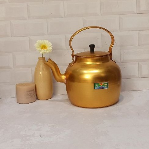 کتری روحی  آلومینیومی3لیتر زردضخیم برند  مهتاب داشتن  دکمه پلاستیکی مشکی روی درب