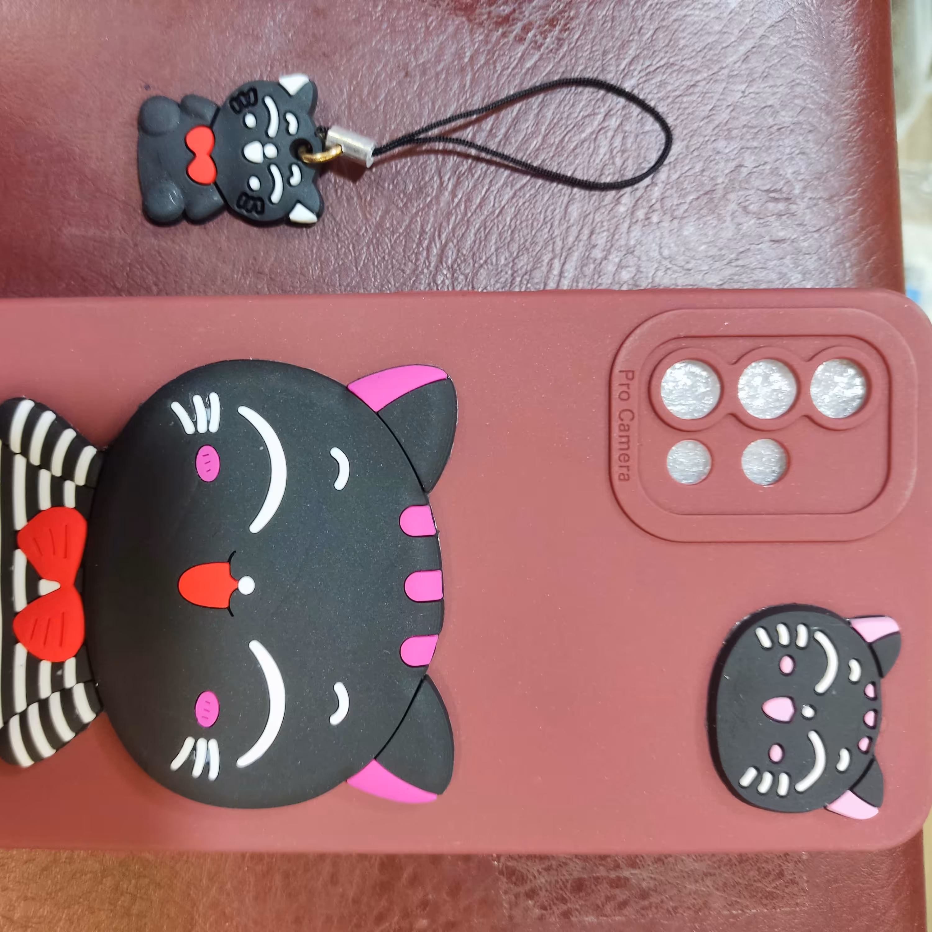 قاب عروسکی به همراه بند اویز سته a51