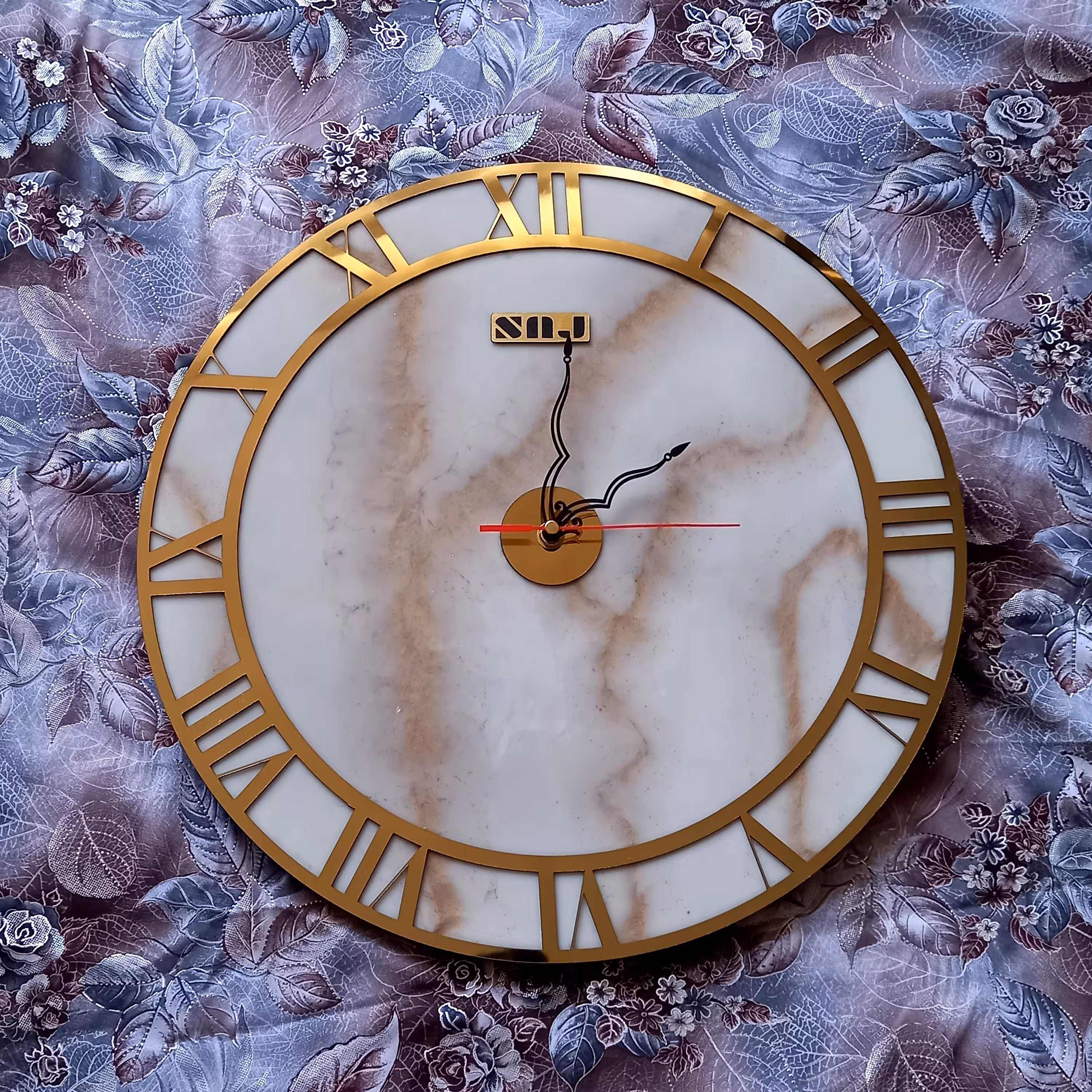 ساعت رزینی طرح ماربل