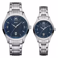 ست ساعت مچی عقربه ای زنانه و مردانه اوبلاک مدل 72700 رنگ استیل صفحه سورمه ای