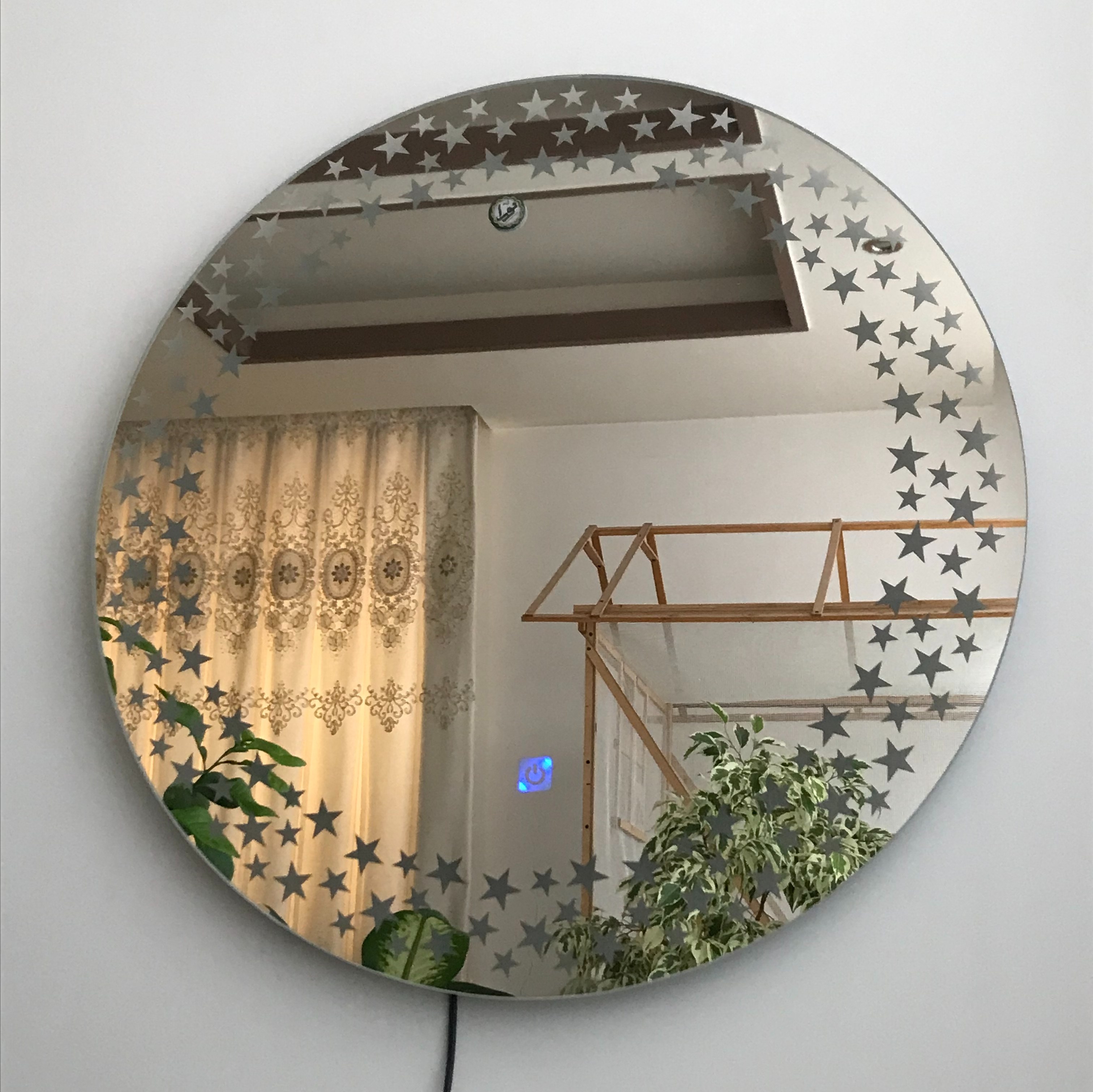 آینه بک لایت نورا . طرح پرستاره . مجهز به سنسور لمسی 12 ولت. قطر 60 سانت 