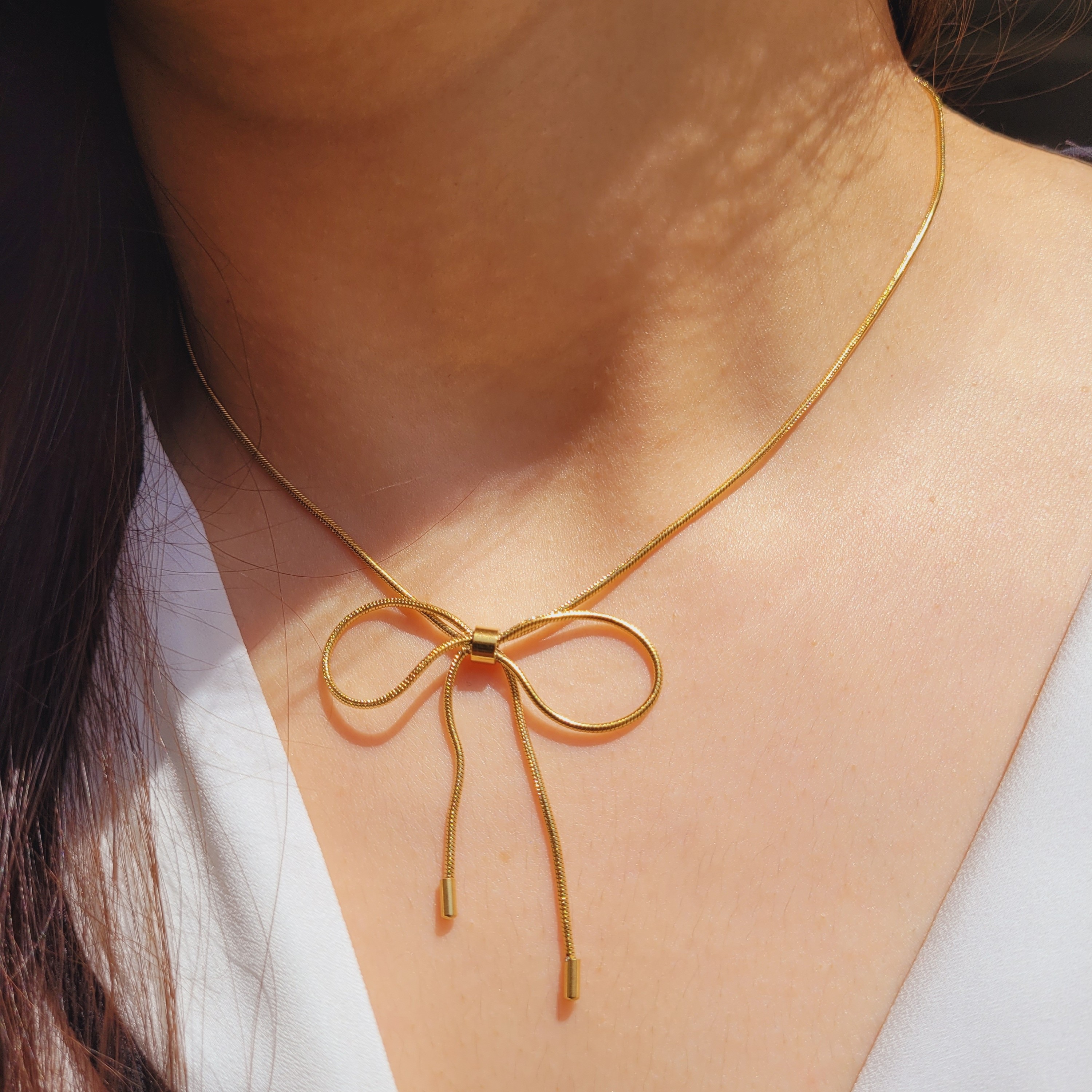 گردنبند طرح پاپیون از جنس استیل ، رنگ گلد ، ضد حساسیت و رنگ ثابت