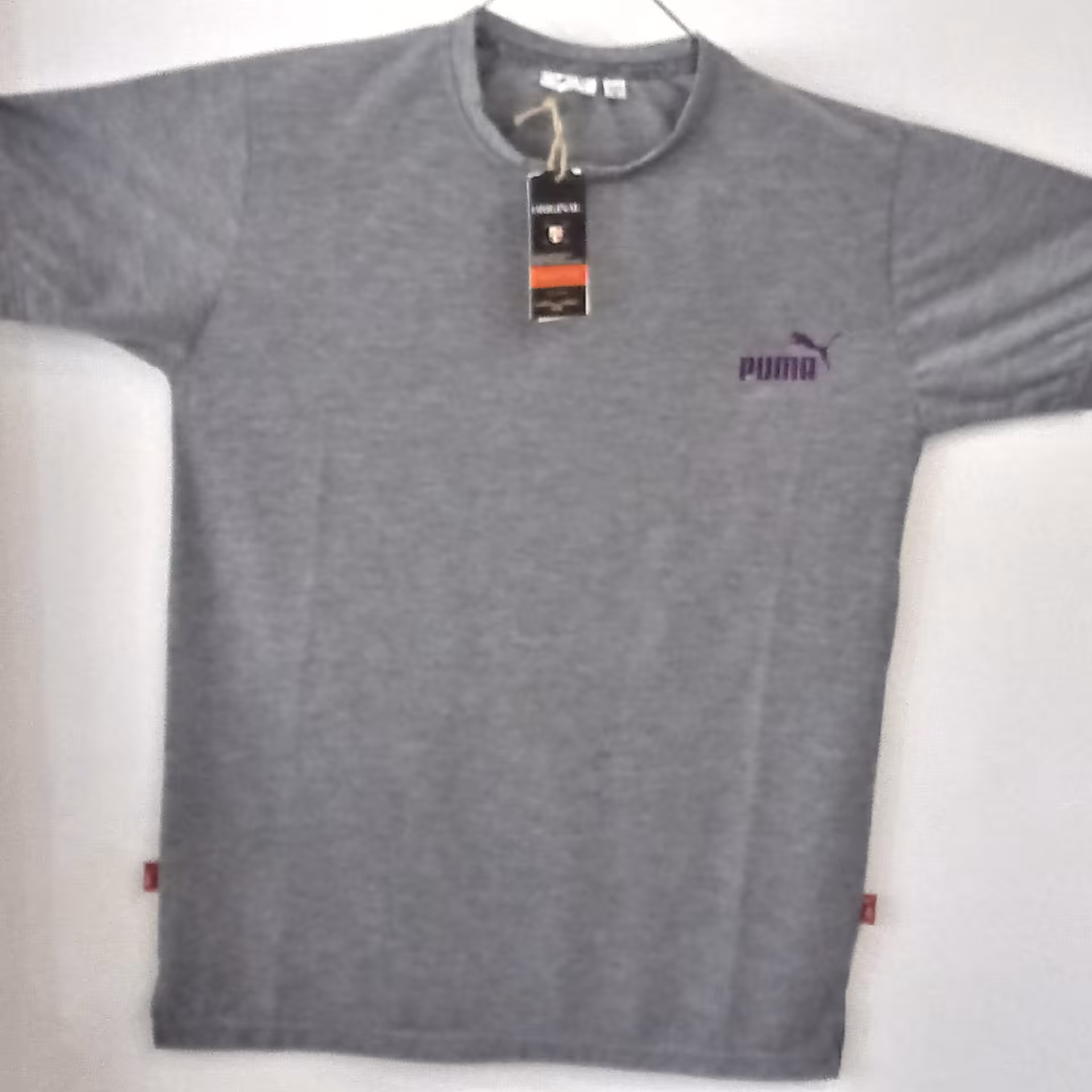 تیشرت ورزشی pumaرنگ ملانژ(طوسی موج دار) ویژه آقا و بانو دختر و پسر