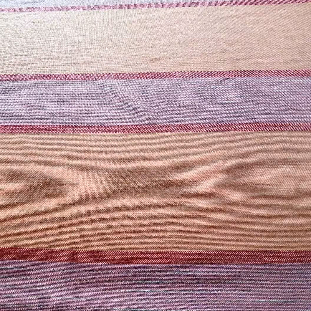 پارچه پرده ای گونی بافت ایرانی عرض 1.5 متر نارنجی روشن و بنفش راه راه (پس کرایه)