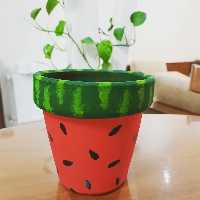 گلدان سفالی هندوانه ای