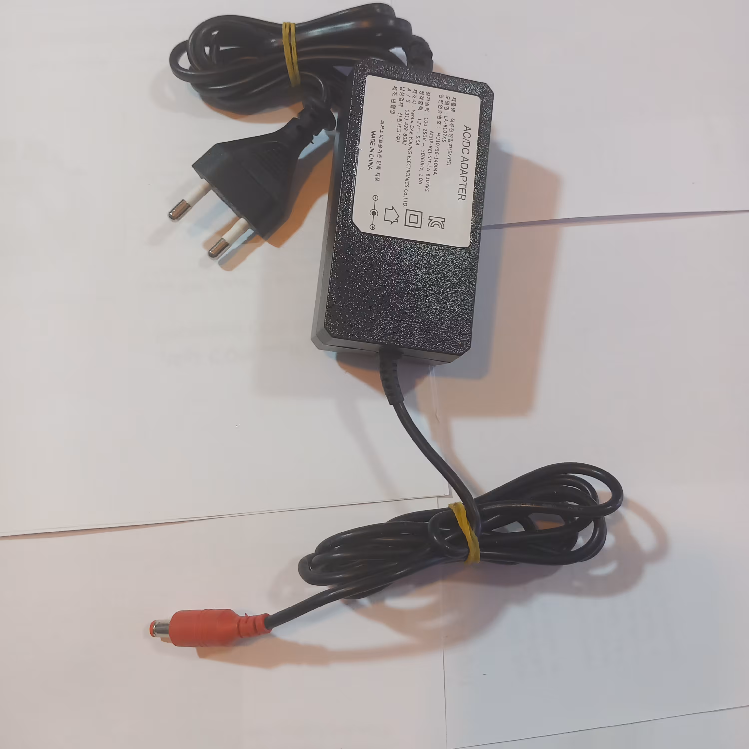 آداپتور 12 ولت 5 امپر هزینه ارسال پست پسکرایه 