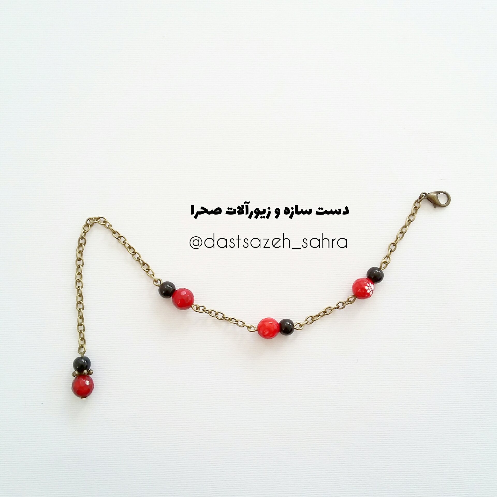 دستبند سنگ عقیق صورتی و انیکس مشکی برنزی