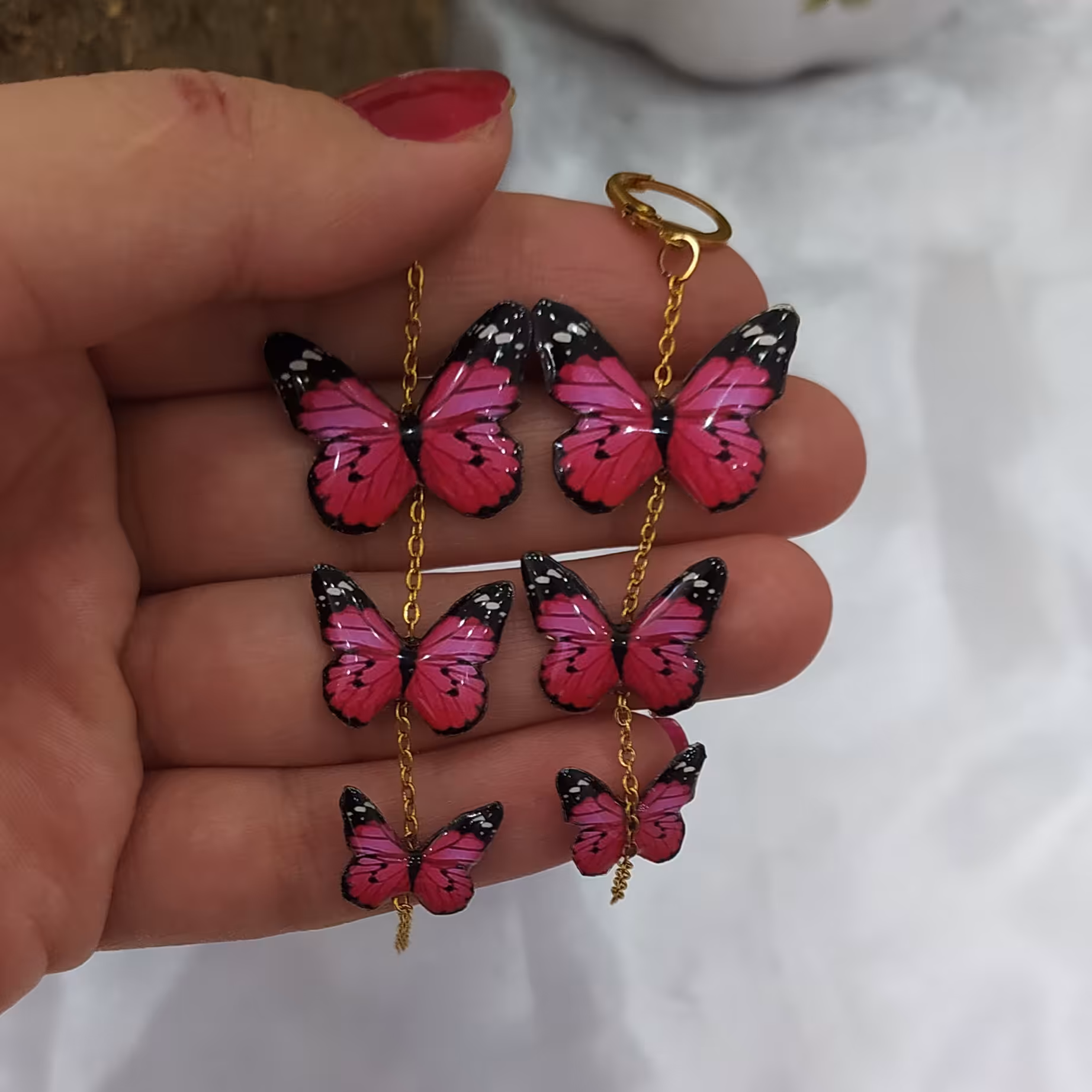 گوشواره سه پروانه رزینی طرح صورتی 