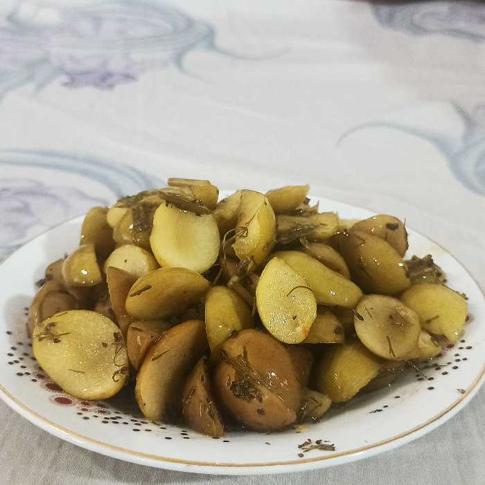 ترشی گوجه سبز شکسته بدون هسته 1000 گرمی