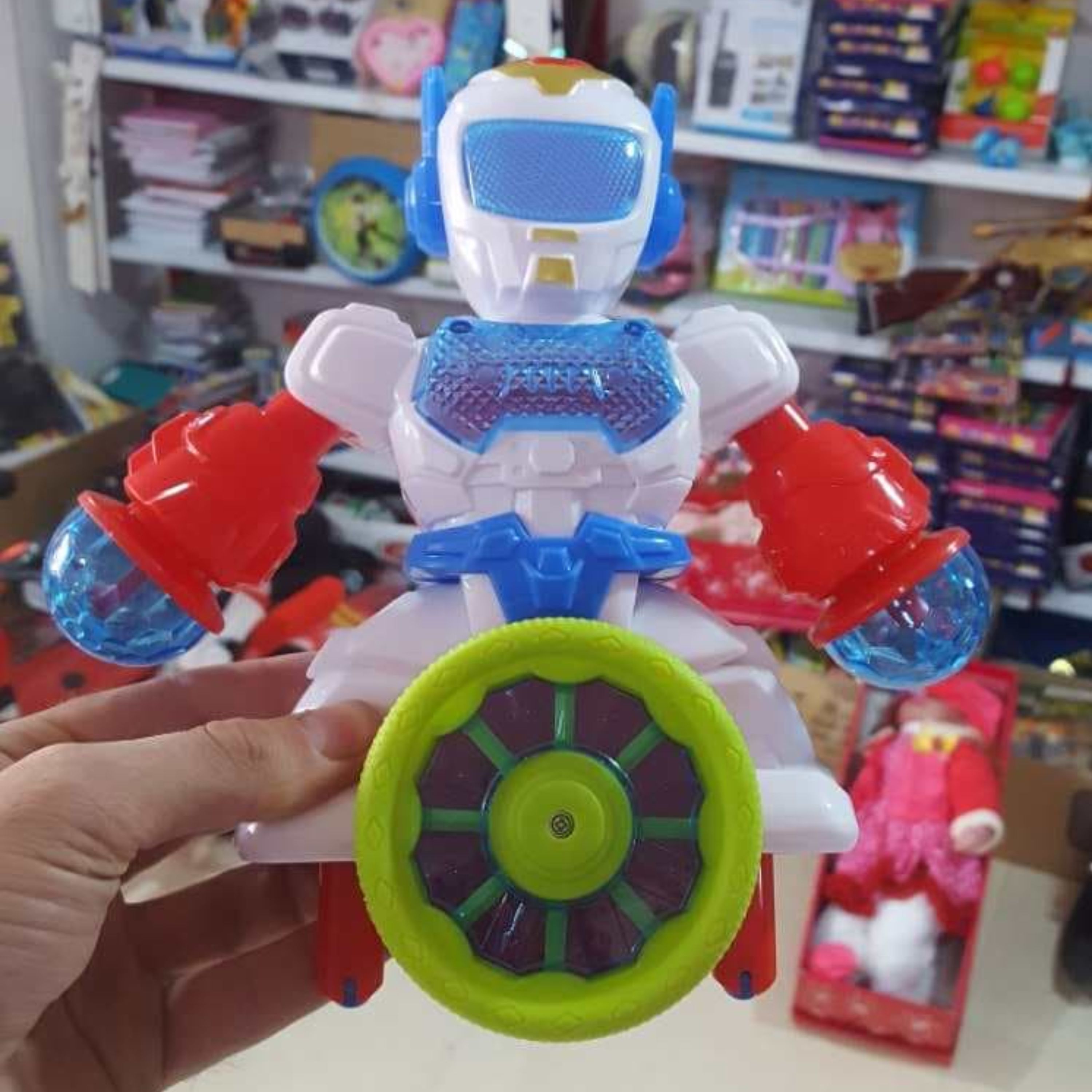 خرید اسباب بازی ربات چرخشی چراغدار 999 به قیمت کارخانه و عمده