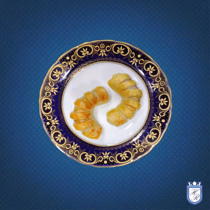 شیرینی کلوچه سیب مخصوص  دست پیچ   کره ای  زعفرانی  یک کیلو  خوش طعم و خوش عطر