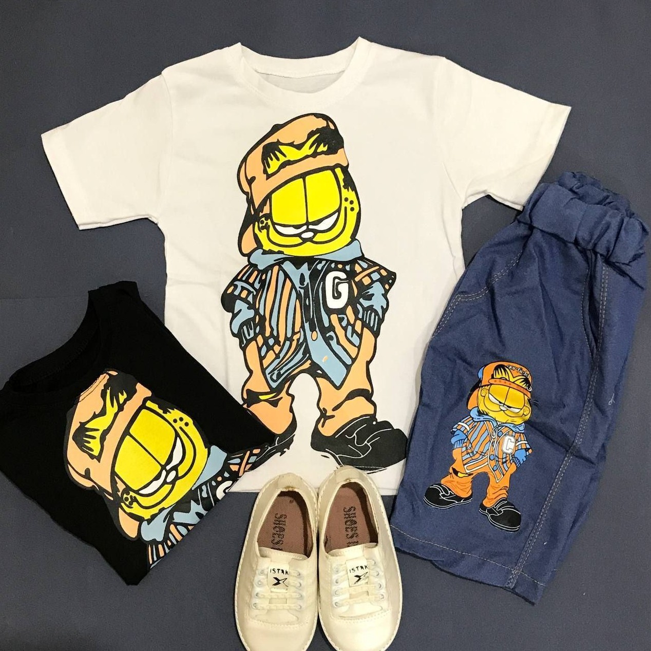 تیشرت شلوارک اسپرت گارفیلد
مناسب 3 تا 9 سال دو رنگ سفید و مشکی جنس تیشرت پنبه و شلوارک جین کاغذی