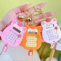 ماشین حساب فانتزی و بازی و آویز کیف و جاکلیدی فانتزی گربه در رنگ های صورتی سفید نارنجی