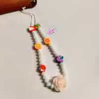 بند آویز گوشی موبایل دخترونه با تزئین مهره کریستال و فیمو میوه