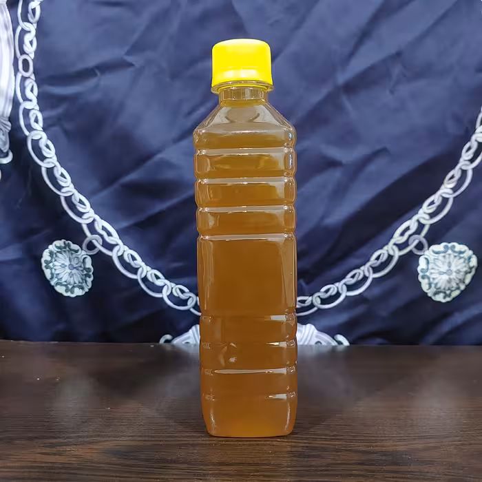 شربت سرکه انگبین تهیه شده با عسل در ظروف نیم لیتری کاملا طبیعی