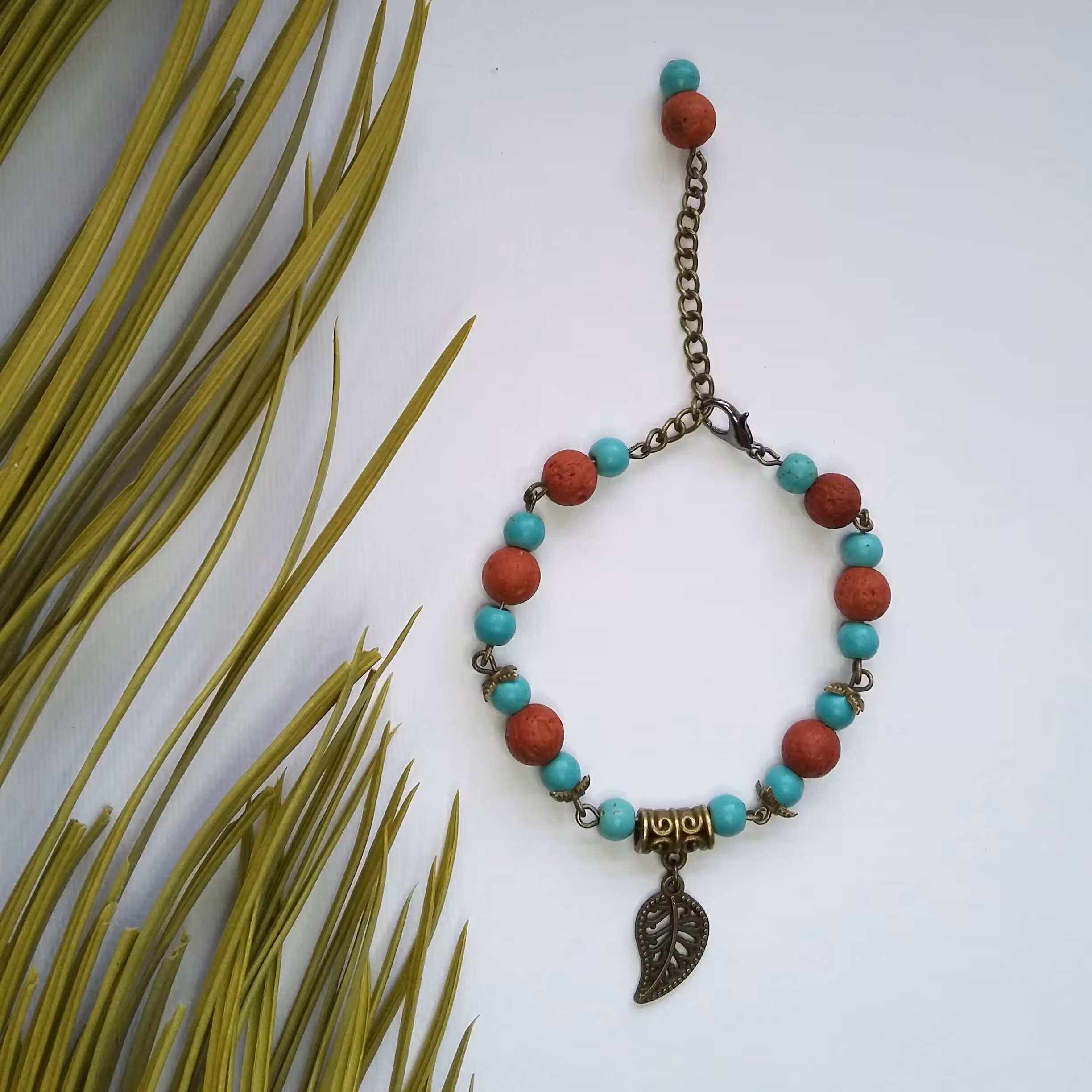 دستبند سنگ فیروزه صنعتی و سنگ لاوا برنزی