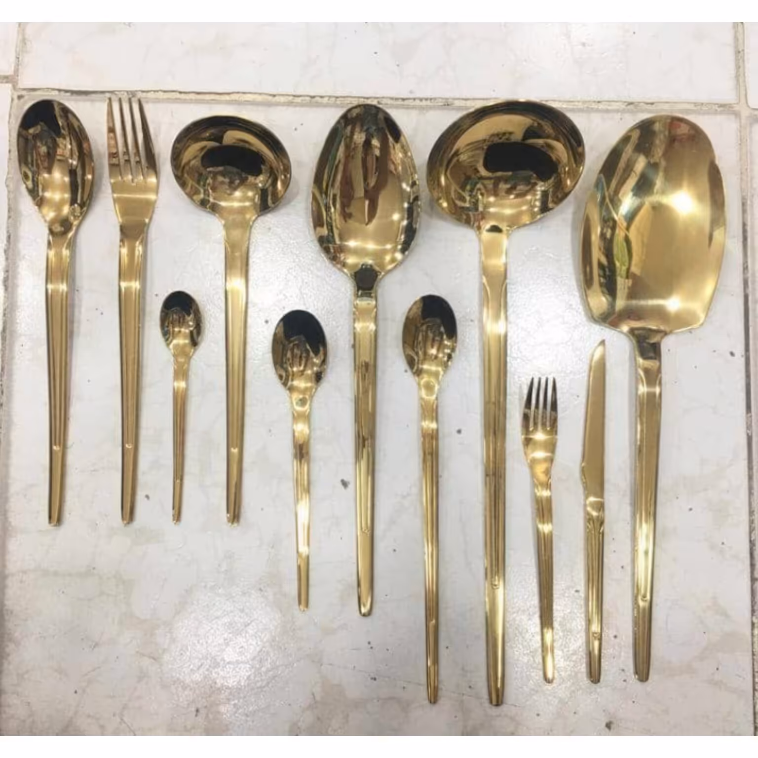 سرویس قاشق چنگال یونیک 120 پارچه دهانه اروپایی استیل نگیر طلایی کد 223