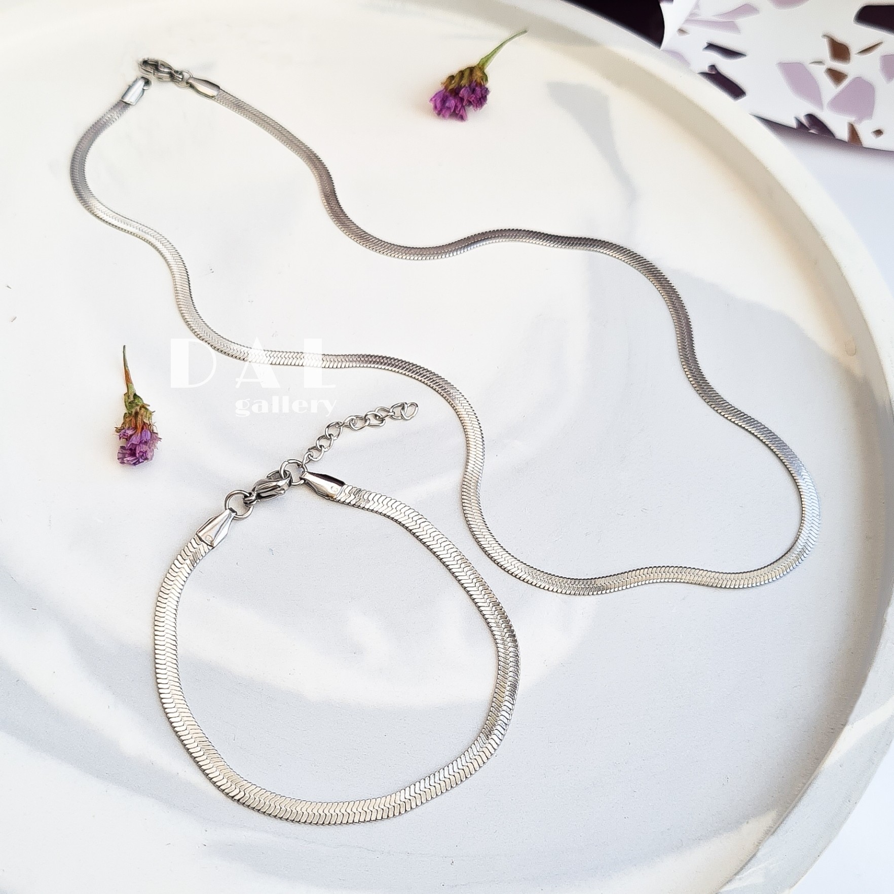 ست گردنبند و دستبندماری نقره ای استیل و رنگ ثابت گردنیند دستبند هرینگبون