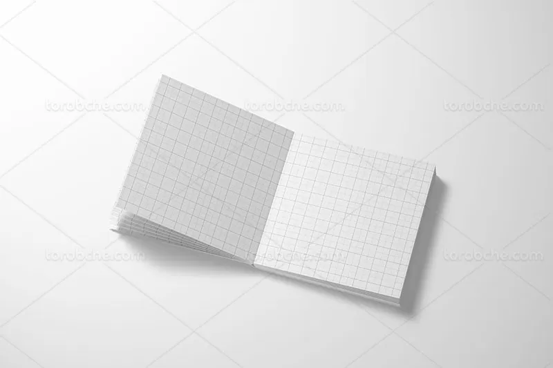 موکاپ لایه باز کتاب از زاویه بالا | گرافیک با طعم تربچه