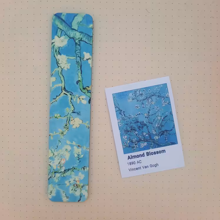 پک نشانگر کتاب چوبی و استیکر لپتاپ شکوفه های بادام 