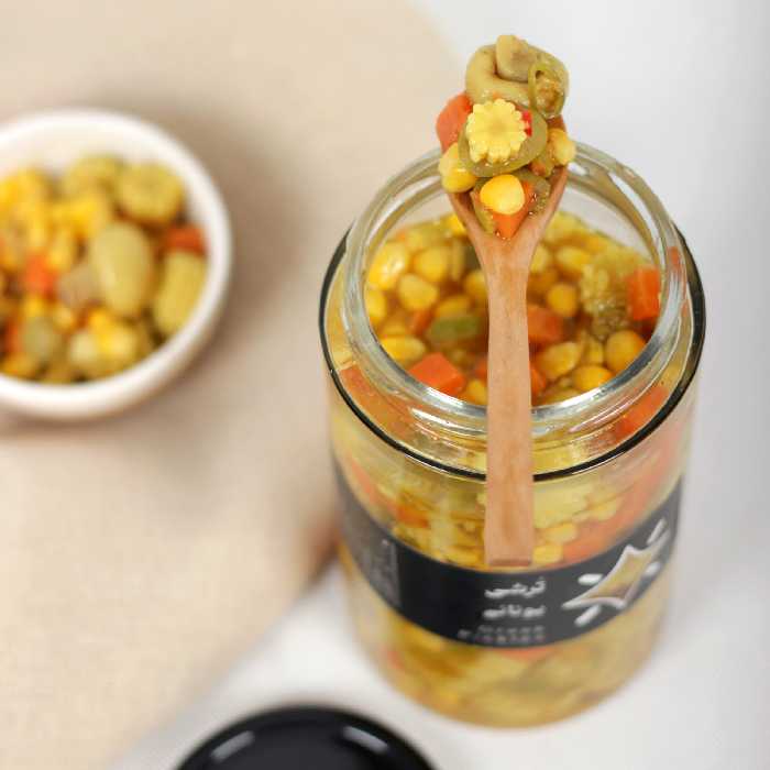 ترشی یونانی تهیه شده با روغن زیتون اعلاو مواد درجه یک ، در بسته بندیِ 350 گرمی  