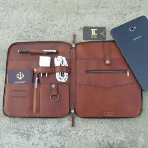 کیف تبلت چرم طبیعی و دست دوز مدل6تیاراچرم مشهد