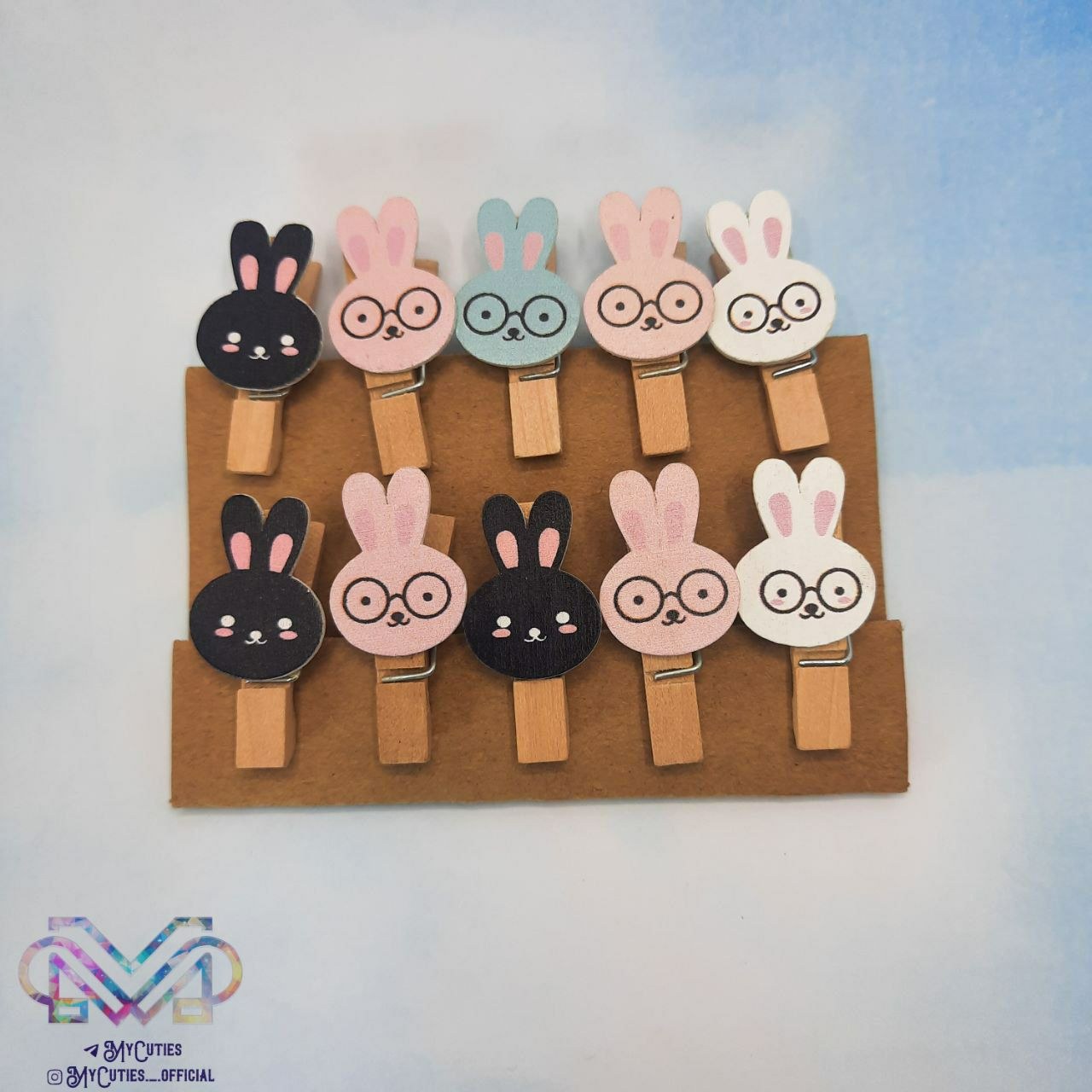 گیره چوبی 10 عددی طرحهای فانتزی همراه بند کنفی