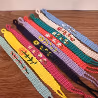 دستبند بافت دوستی با نخ کوبلن