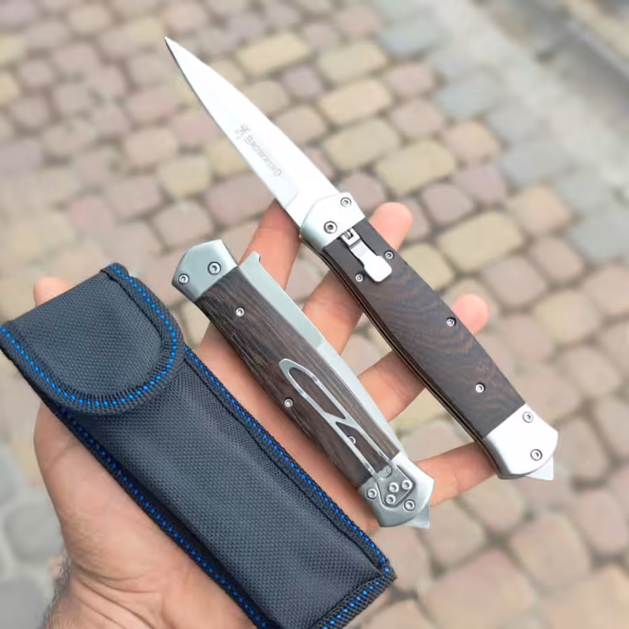 چاقو ضامندار پرشی ، خارجی و بسیار تیز و باکیفیت ، تیغه ضد زنگ دارای شیشه شکن انتهای دسته