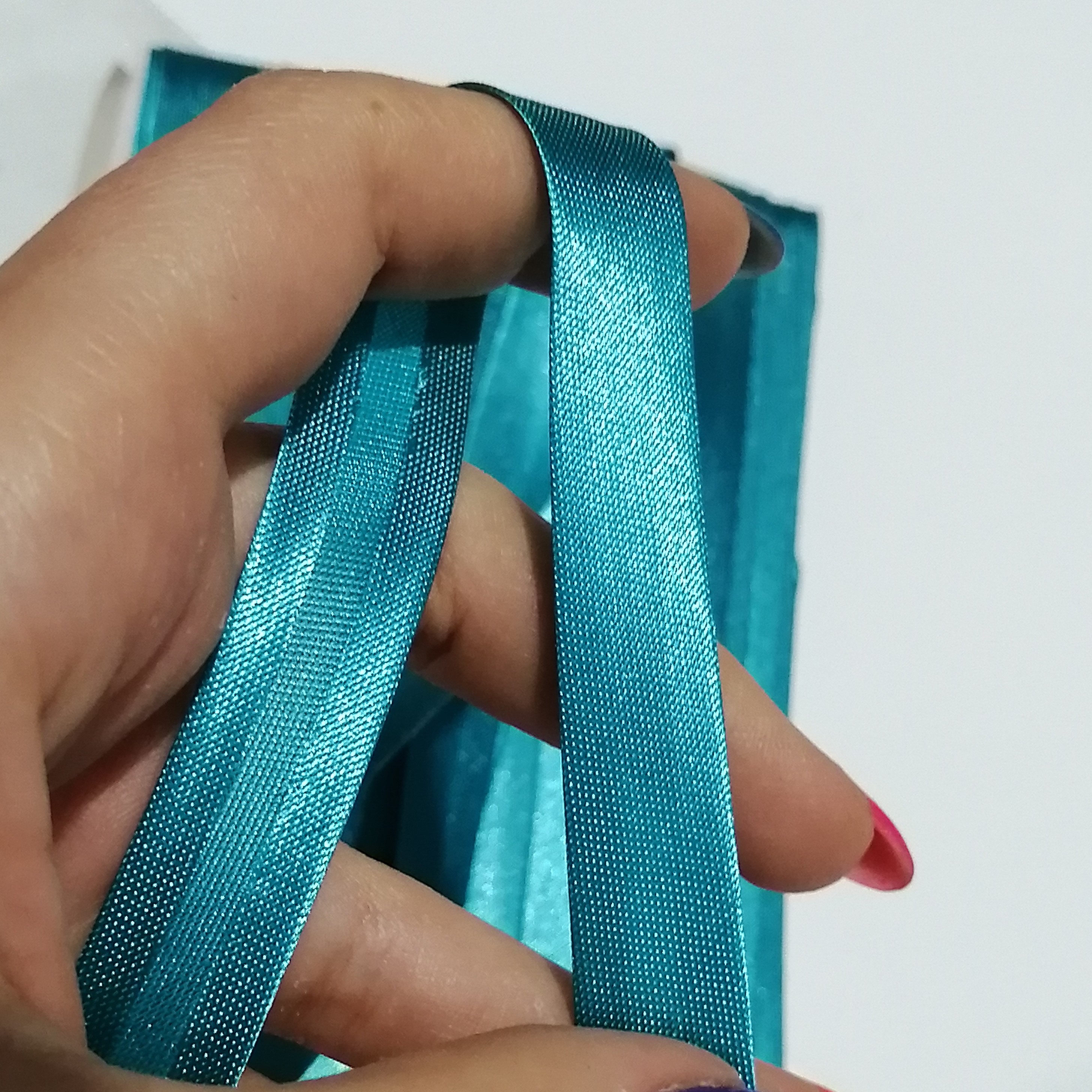 نوار اریب فیروزه ای عرض یک و نیم یک متر
