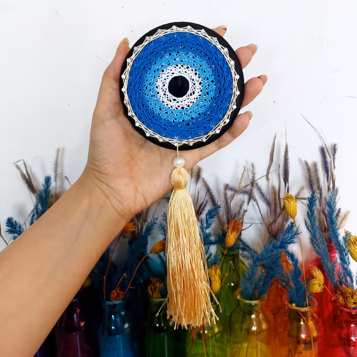 تابلو میخ و نخ چشم نظر .اندازه 10 سانتی  همراه با منگوله 