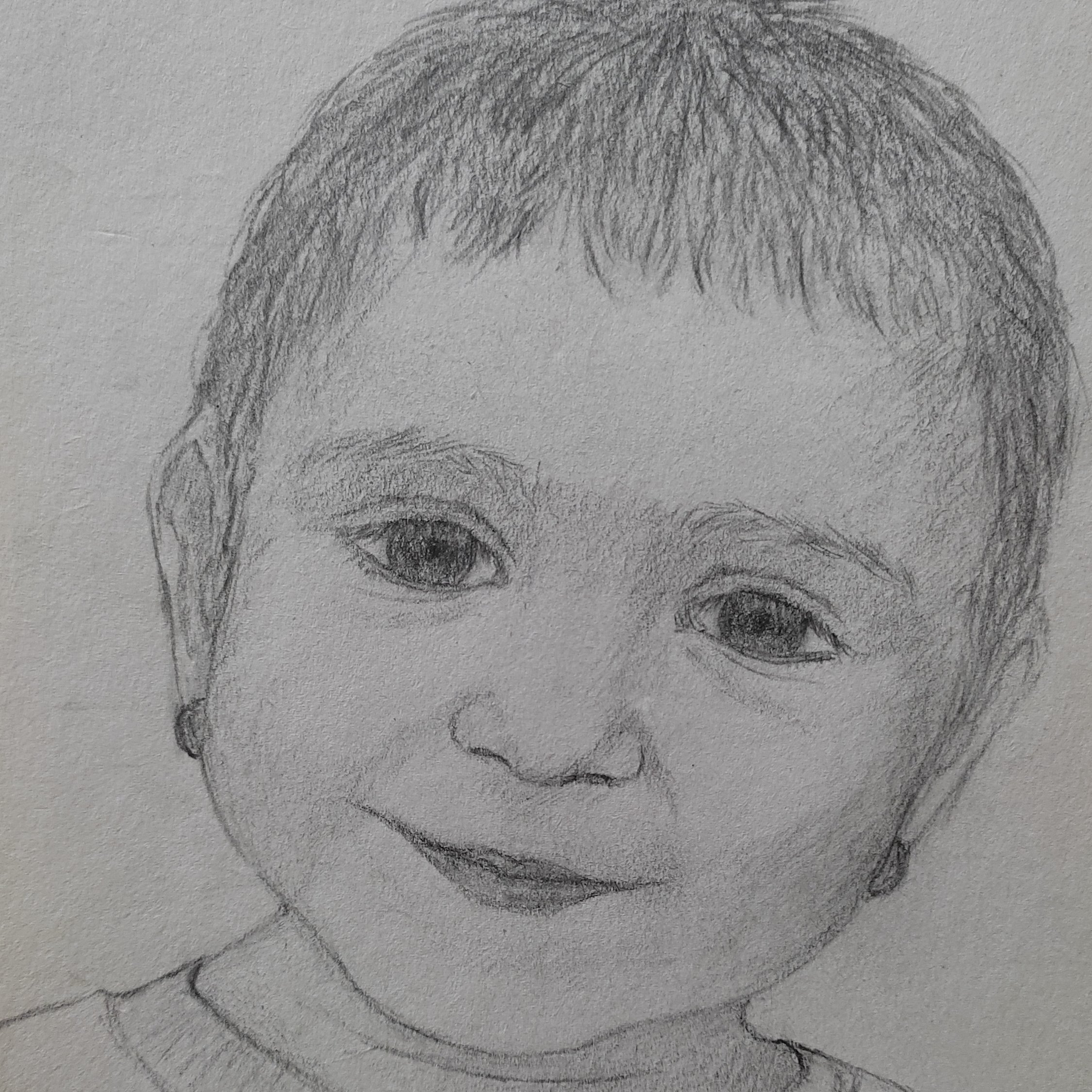 اسکچ و طراحی  چهره کودک سایزA5 کارشده برروی کاغذ کاهی