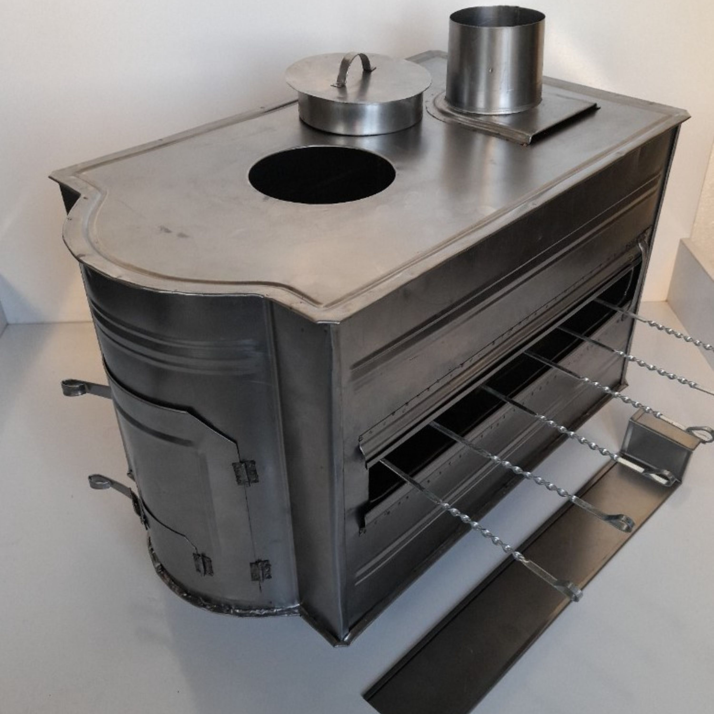 بخاری هیزمی سه کاره (بخاری - کباب پز - غذاساز)