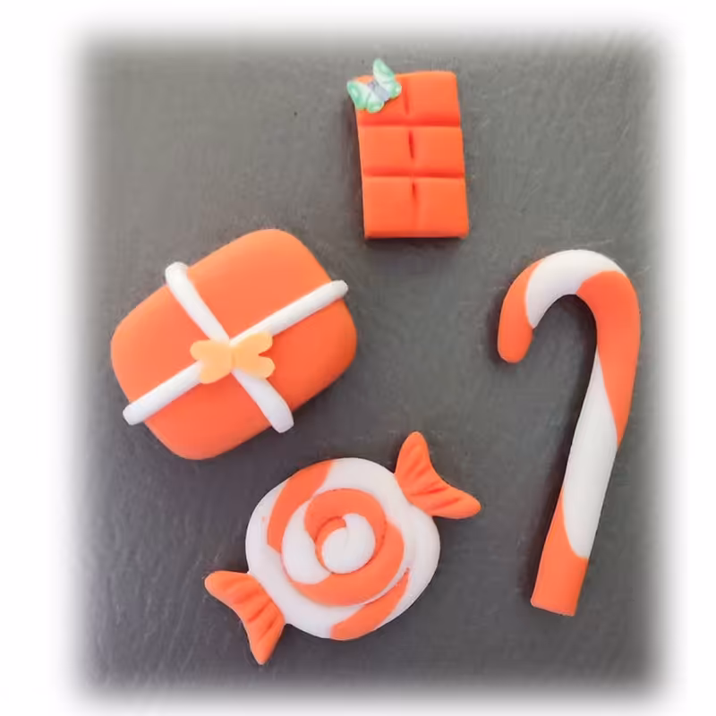 مگنت یخچال شکلات و کاکائو و  بسته کادو و آبنبات عصایی4عددی خمیری نارنجی mk182