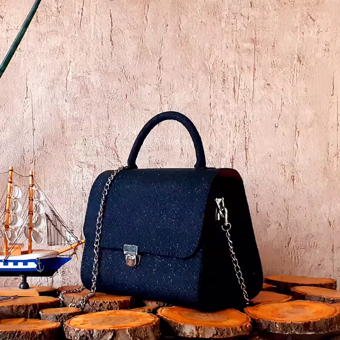 کیف مجلسی زنانه . چرم طبیعی . کاملا دست دوز 