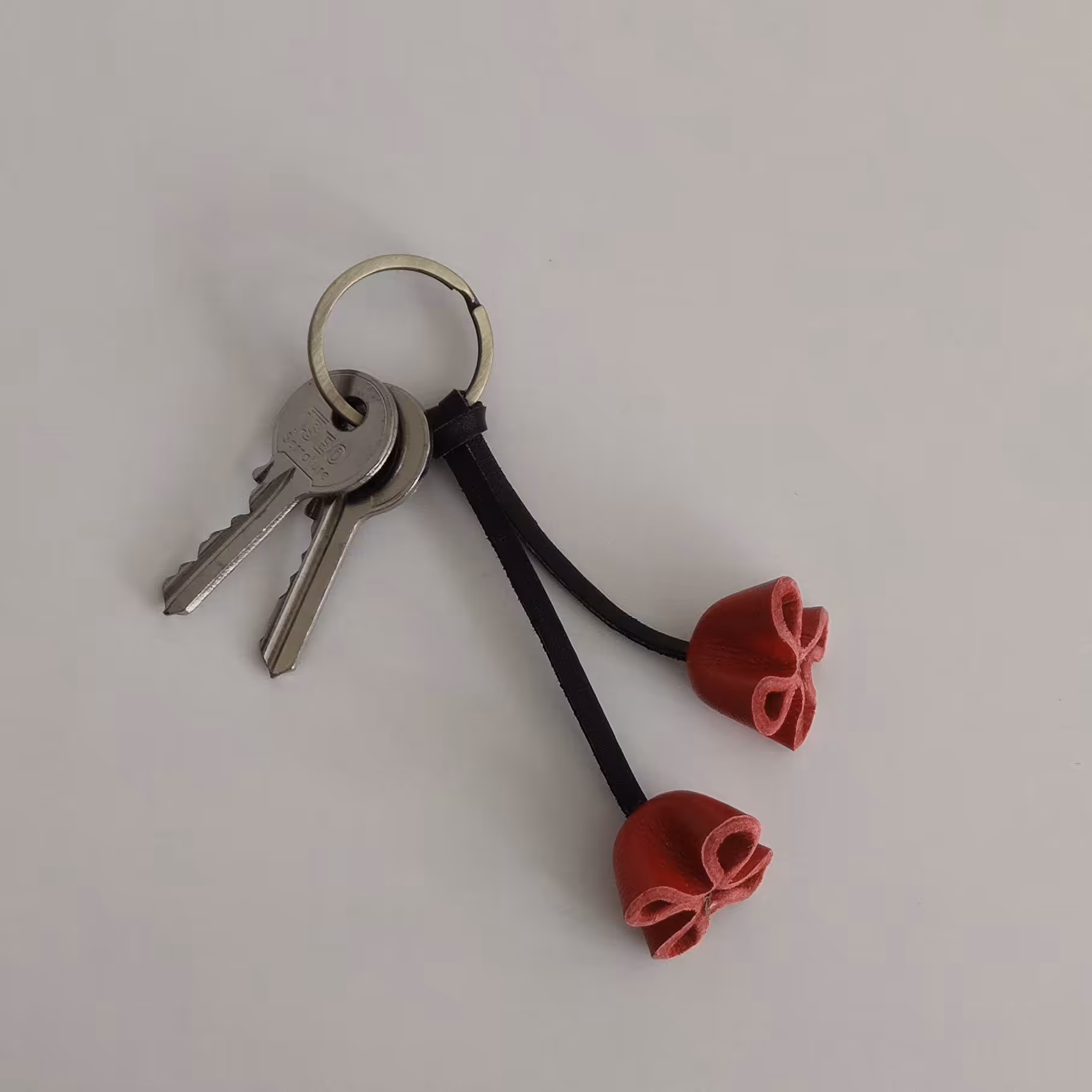 جاکلیدی چرمی مدل گل آویز