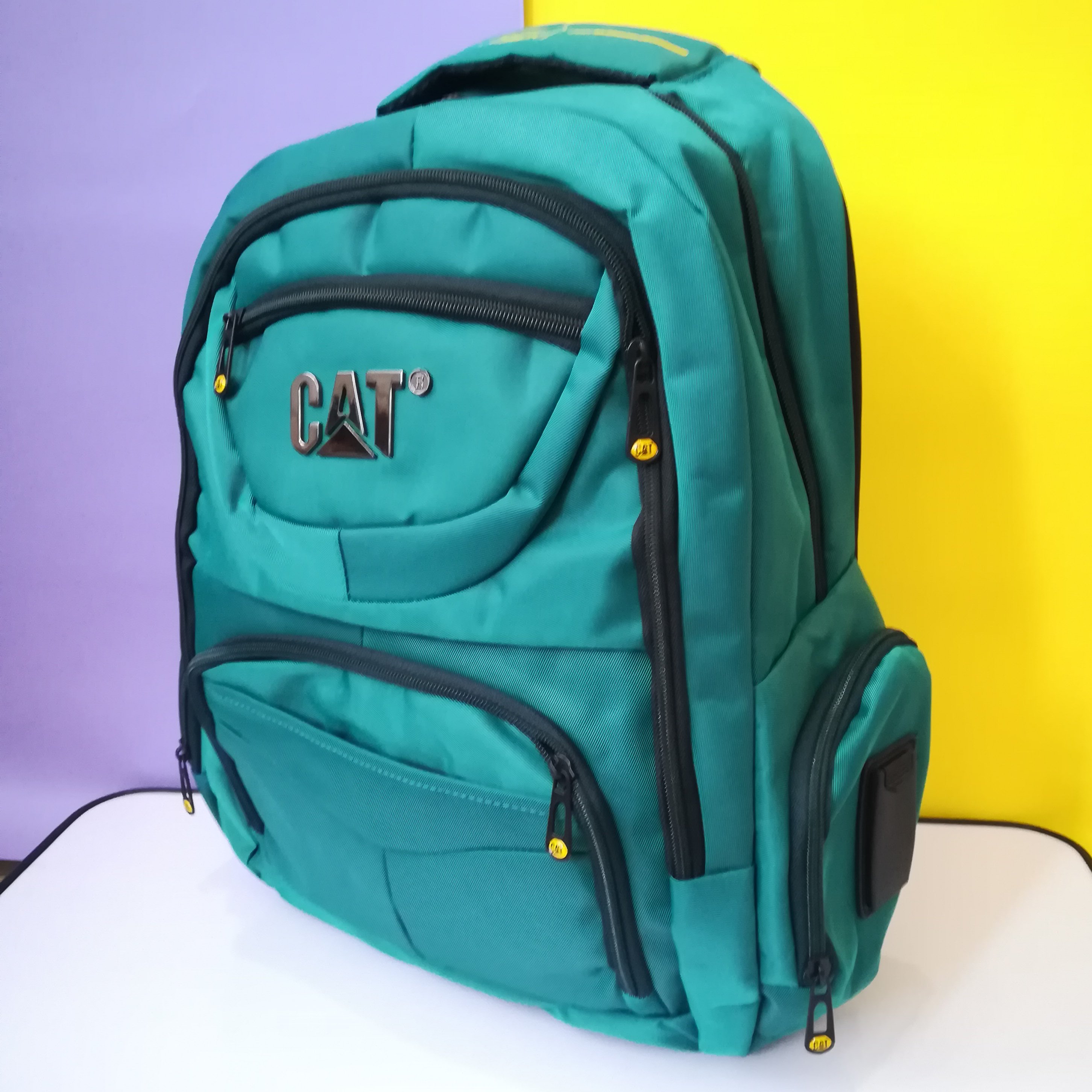 کوله پشتی جنس پیرگاردین مدل جیب پفکی(جای لب تاپ دار) (هندزفری و پورت usb دار) کیفیت عالی و مستحکم