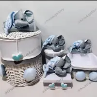 اکسسوری اتاق کودک شامل سبد لباس سبد لوسیون سطل و جادستمال فیل نانان مخمل هیواد گالری