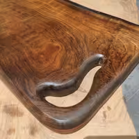 تخته سرو و تخته گوشت چوب گردو مشکی با طول 46و عرض تقربی30سانت 