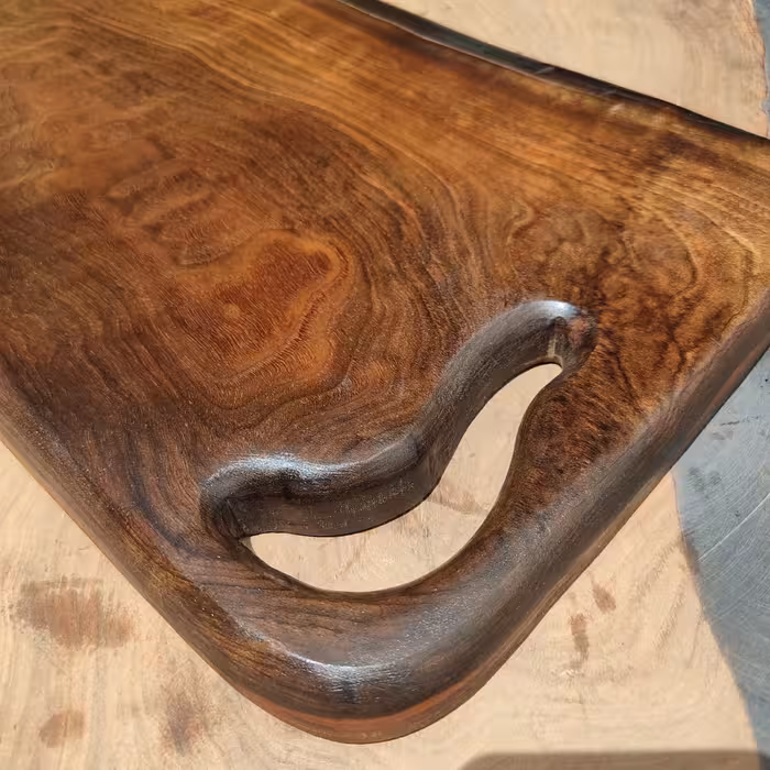 تخته سرو و تخته گوشت چوب گردو مشکی با طول 46و عرض تقربی30سانت 