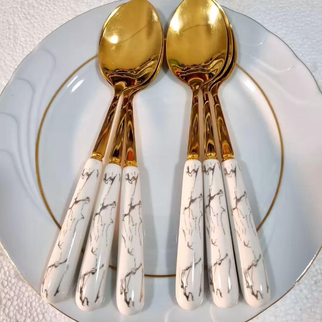 قاشق و چنگال غذاخوری دسته سرامیکی طرح ماربل طلایی