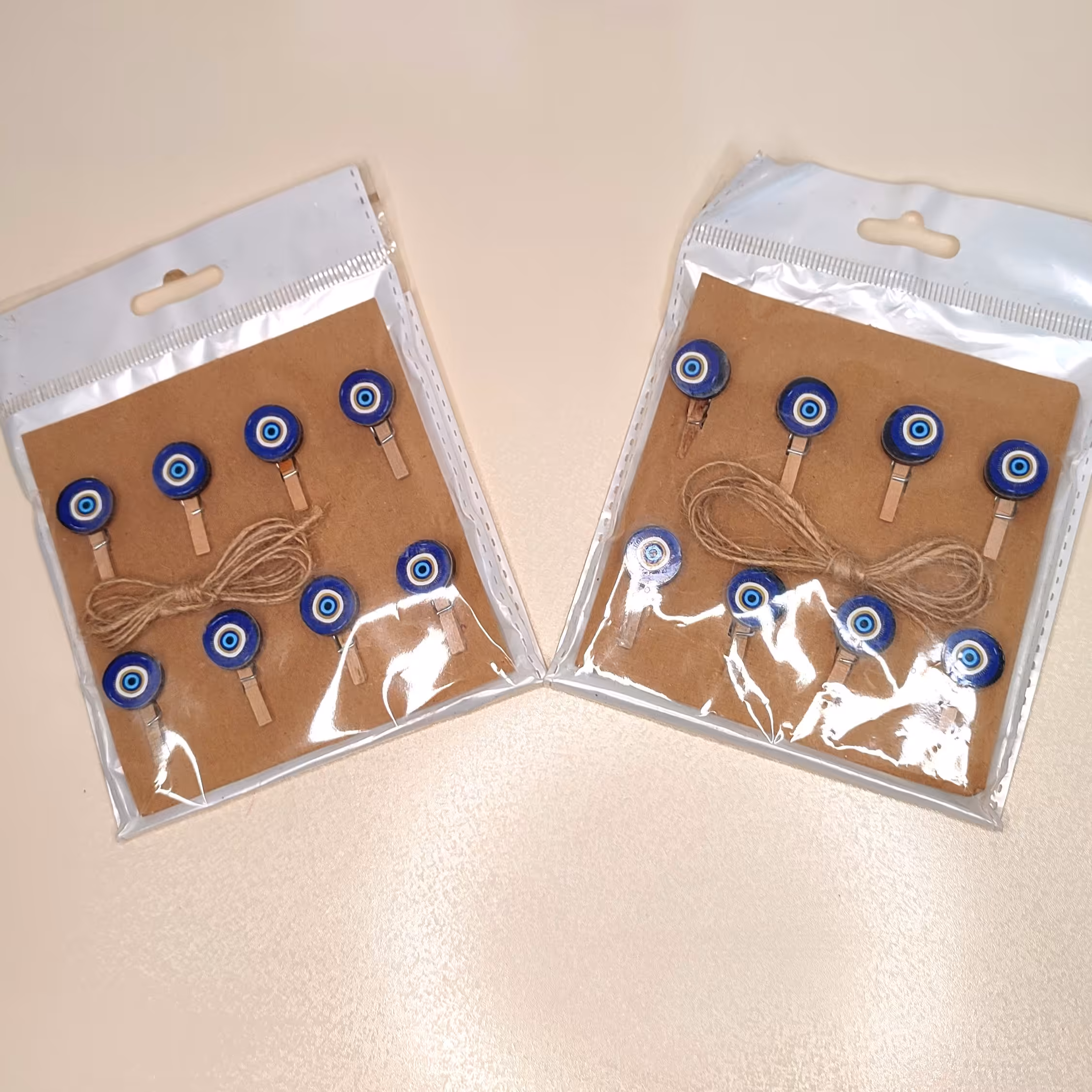 گیره عکس 8 تایی 
طرح چشم نظر
بند کنفی یک متری
 با اینا گیره ها خاطراتت همیشه جلوی چشماته