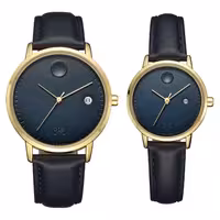 ست ساعت مچی عقربه ای زنانه و مردانه اوبلاک مدل 72696 رنگ طلایی صفحه سورمه ای