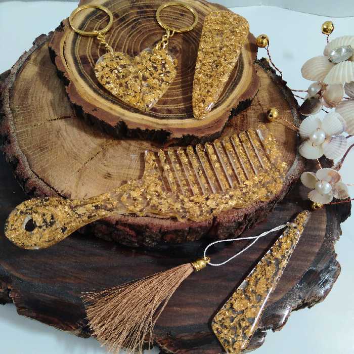 شانه رزینی ست بسیار زیبا کار شده با ورق طلا 