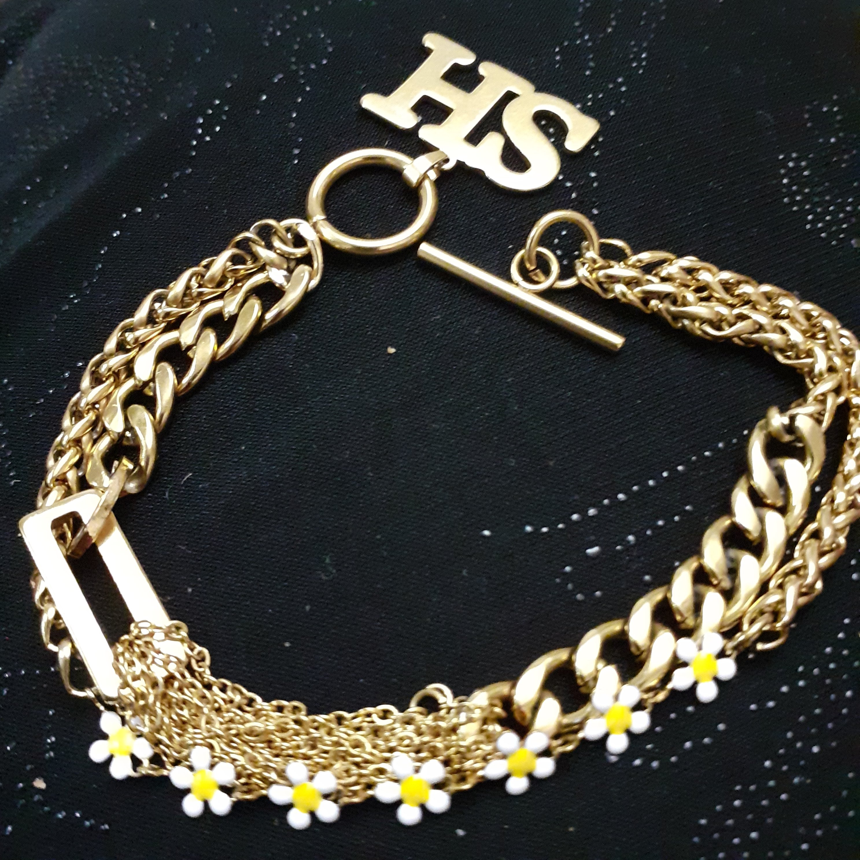 دستبند سه  ردیفه تمام استیل  با گلهای بابونه  استیل کد 6789