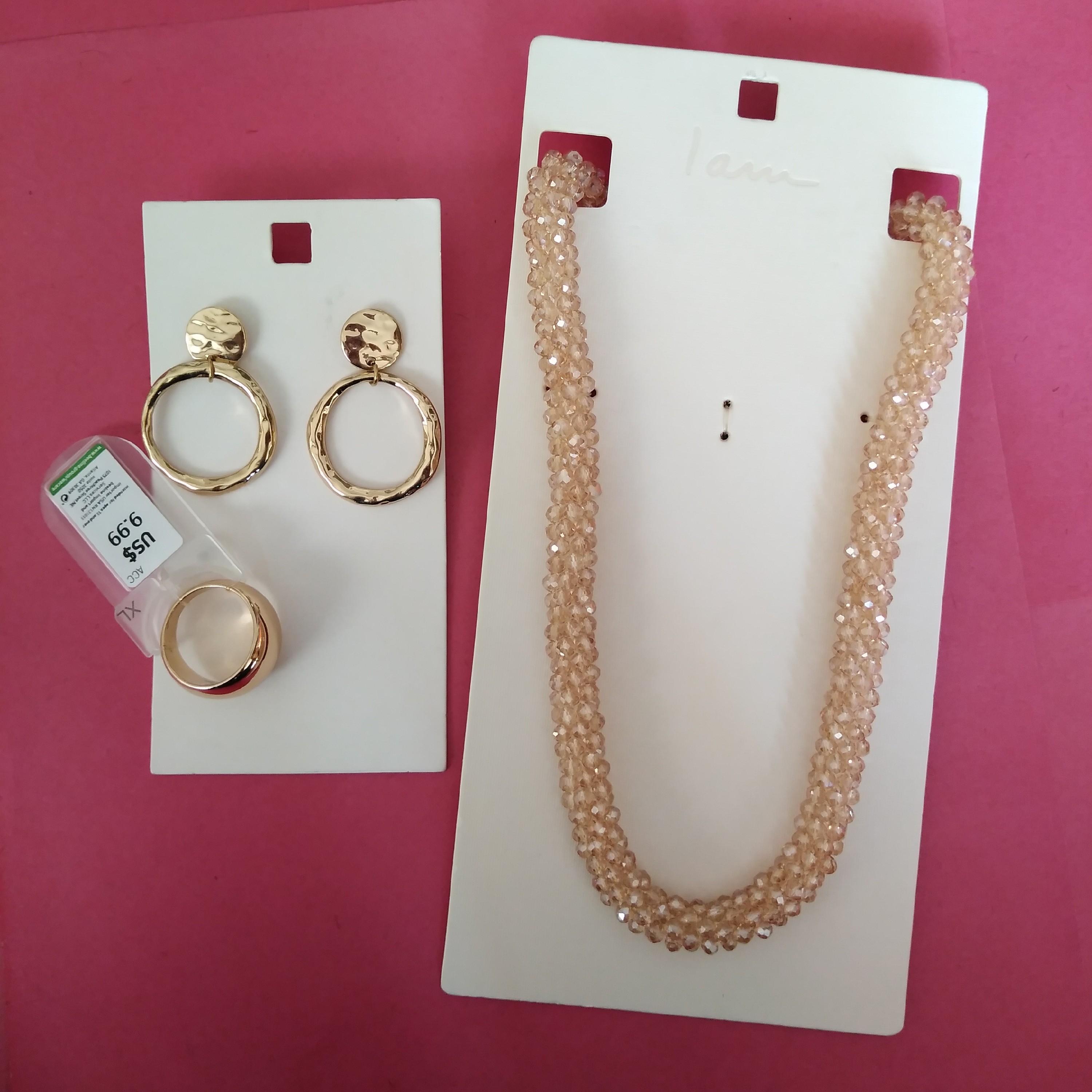 پک 3 عددی زیور آلات برند iam شامل گردنبند. گوشواره حلقه ای و انگشتر رنگ طلایی