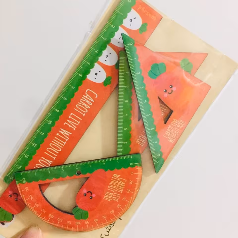 ست تحریر فانتزی  طرح هویجی شامل  خط کش 2 عدد گونیا و نقاله 